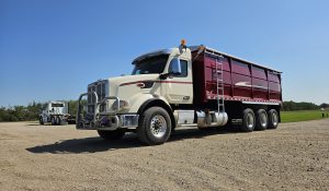 2023 Peterbilt 567 Tri-Drive 24′ Grain Truck